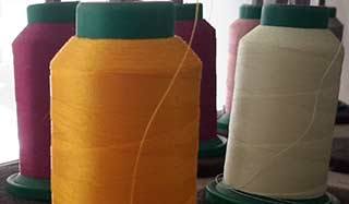 image of cones on thread